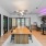 large room with island and barstools