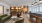 large room with couches and pool table