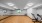 large room with wood floors and mirror