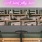 community workspace with neon sign