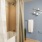 bath tub near blue wall