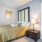 bed with green comforter